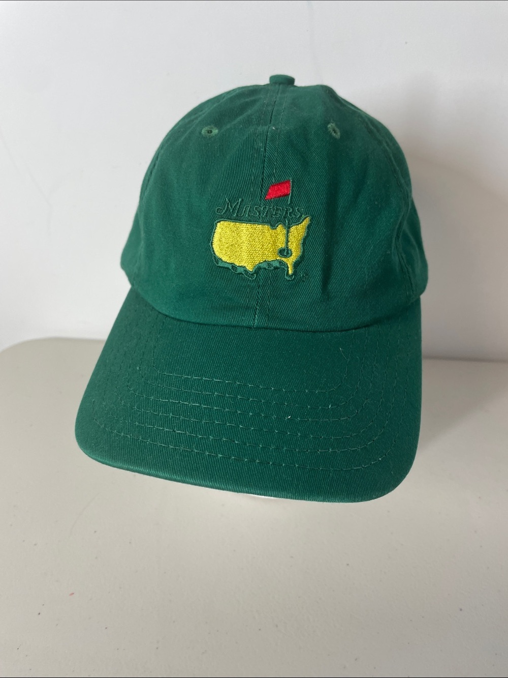 Masters American Needle Green Hat with Yellow Logo and Red Accent Golfing